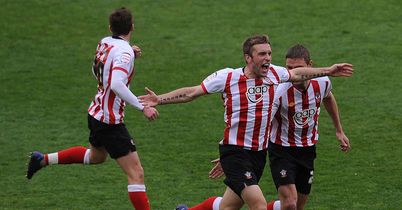 Lambert: Celebrates at Selhurst